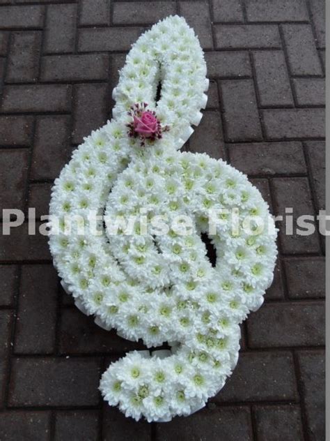 A funeral is a ceremony for celebrating, sanctifying, or remembering the life of a deceased person. G Clef Musical Note Made In Flowers For A Funeral ...