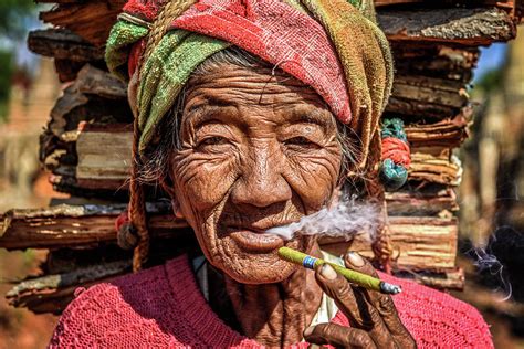 Old Wrinkled Woman Smoking A Cheroot Cigar Photograph By Miroslav Liska