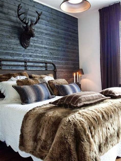 Masculine Bachelor Bedroom With Deer Head Decor Homemydesign