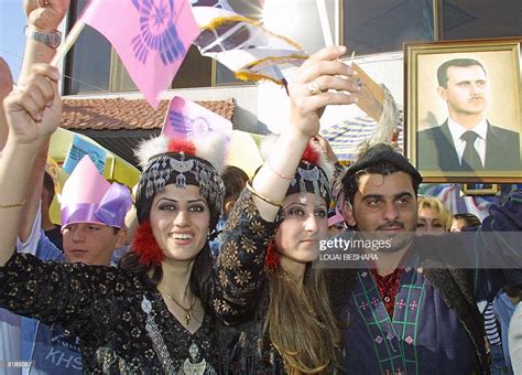 Iraqi Assyrians Living In Syria Holding A Picture Of Syrian News Photo Getty Images