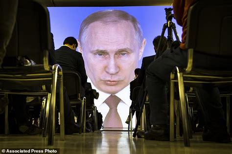 A Self Assured Putin Seems Confident Of Electoral Victory Daily Mail