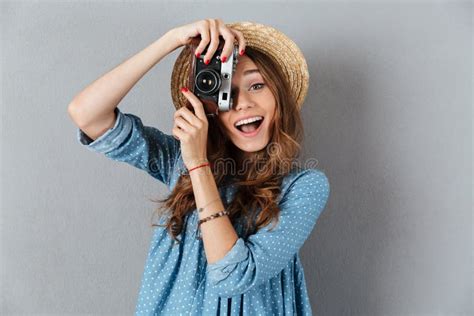 Smiling Young Caucasian Woman Photographer Holding Camera Stock Image