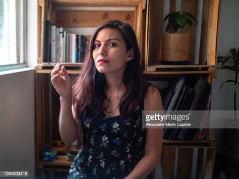 Woman Exhaling Smoke Photos And Premium High Res Pictures Getty Images