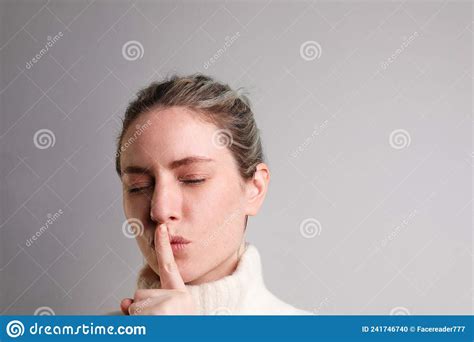 Silent Gesture Woman Holding Finger On Lips Isolated Space For Text