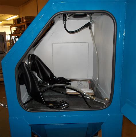 I have now settled on using a discarded domestic chest freezer cabinet, they have a lift up lid, with a good seal around it. BEAD BLASTING CABINET BB850XLD-FL
