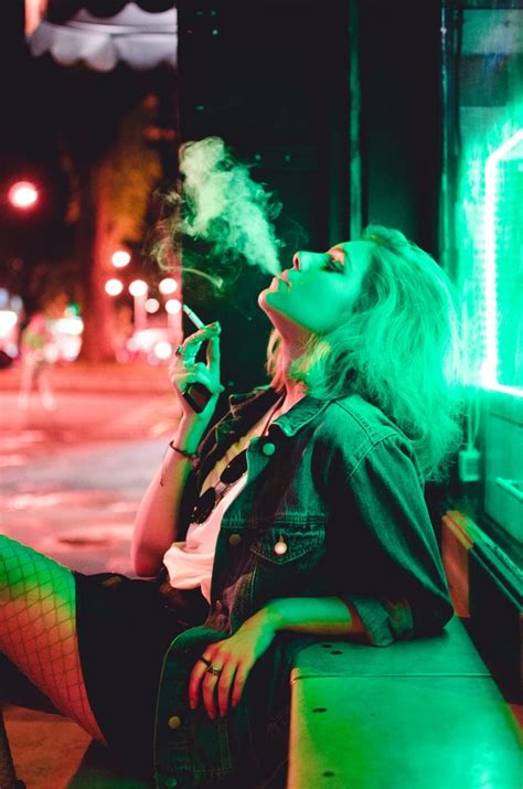 photo by daniel monteiro on unsplash neon photography girl smoking pose reference photo