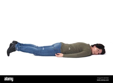 Woman Lying On The Floor On White Background Stock Photo Alamy