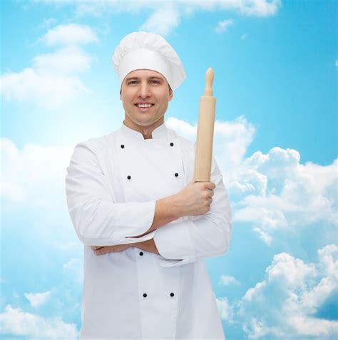 Premium Photo Cooking Profession And People Concept Happy Male Chef Cook Holding Rolling