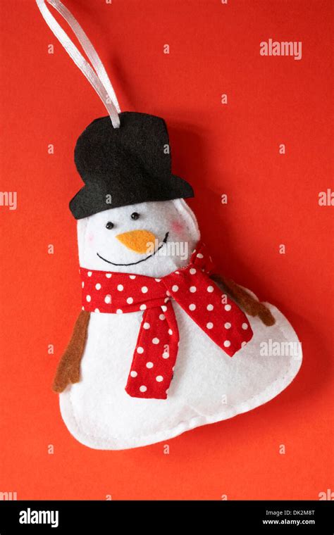 Snowman Wearing Red Polka Dot Scarf And Black Top Hat Hi Res Stock