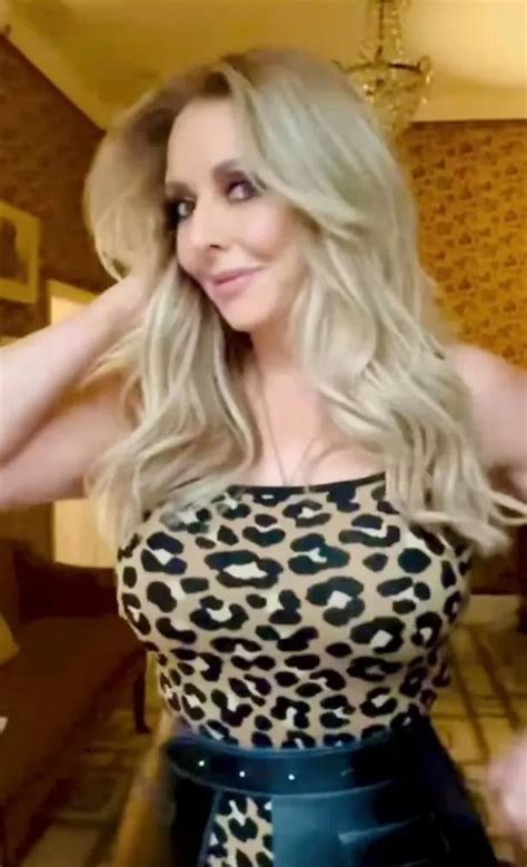Hottest Milf Carol Vorderman Arches Back In Clingy Dress As Fans