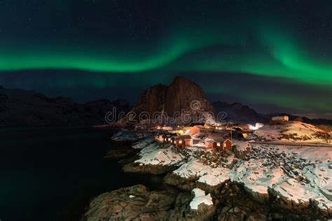 Northern Lights Over The Hamnoy Village At Night In Winter