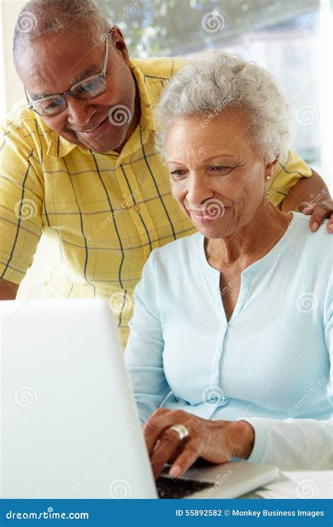 Senior Couple Using Laptop At Home Stock Photo Image Of Happy Person