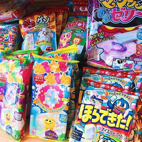 Create a beautiful cherry blossom wall hanging or traditional japanese dragon puppet. stocked on DIY candy kits by kawaiicorner | Japanese candy kits, Candy kit, Japanese sweets