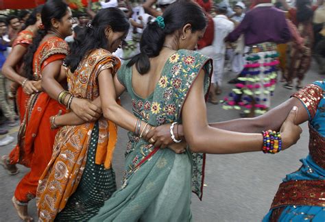 Tribal Dancers From The Western Indian State Of Gujarat Perform At A Rally To Mark International