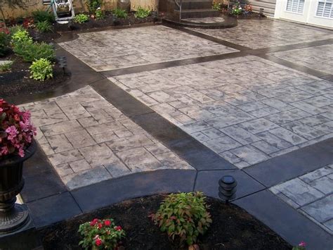 Seamless slate patio & walkway with charcoal colored borders. Stamped Concrete Patio: Ashlar Slate - Color: Natural ...