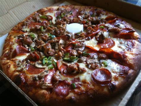 Irene made this place inviting, clean and the food is so good. Eat Like a Champion: Haus of Pizza: Earn it!!!