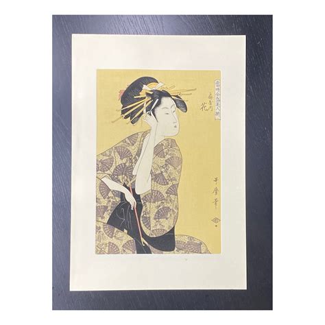Kitagawa Utamaro Pipet en opium pour femme semi nue fumant imprimé