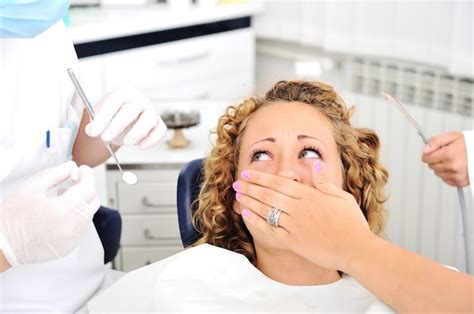 Premium Photo Scared Girl At Dentists Teeth Checkup