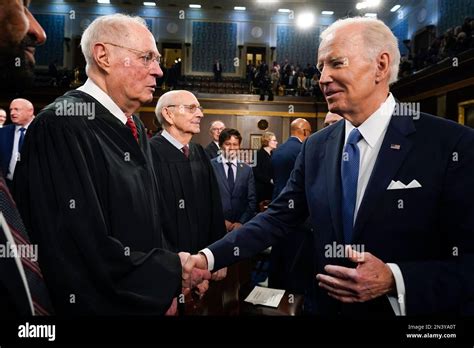 Washington. 7th Feb, 2023. President Joe Biden shakes hands with