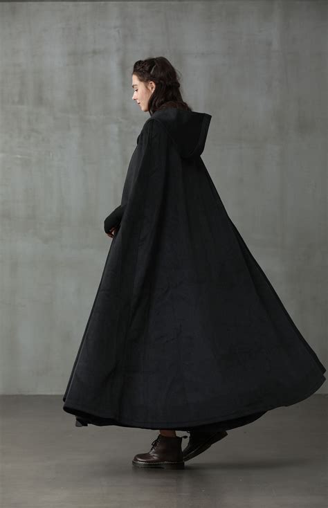 Few Things Will Make You Want To Leave Your House On A Chilly Day But This Cloak Coat Will