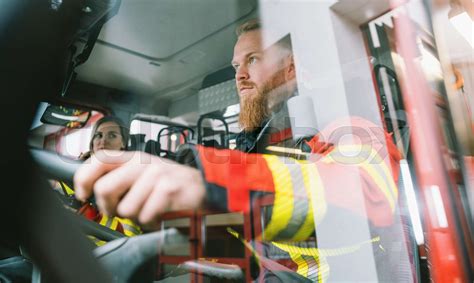 Driver Of A Fire Truck In Action Stock Image Colourbox