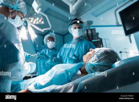 Patient Lying On Operating Table In Surgery Room Stock Photo Alamy