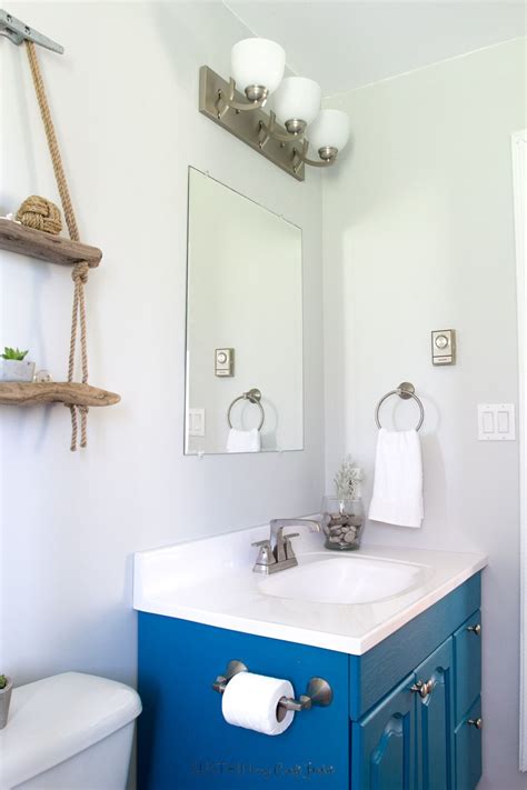 Designed with 21 wall decals featuring blue whales. Budget-Friendly Beach Themed Bathroom Makeover | Beach ...