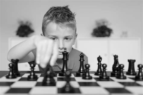 Boy Playing Chess - Monkstown ETNS