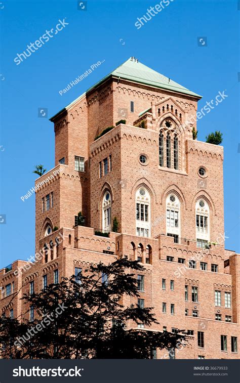 Old Style Architecture Brick Apartment Building With Gothic Arched