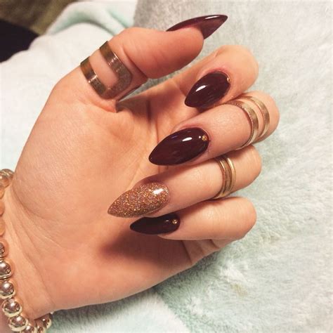 dark red almond nails almond nails are a popular style in the world of manicure debora milke