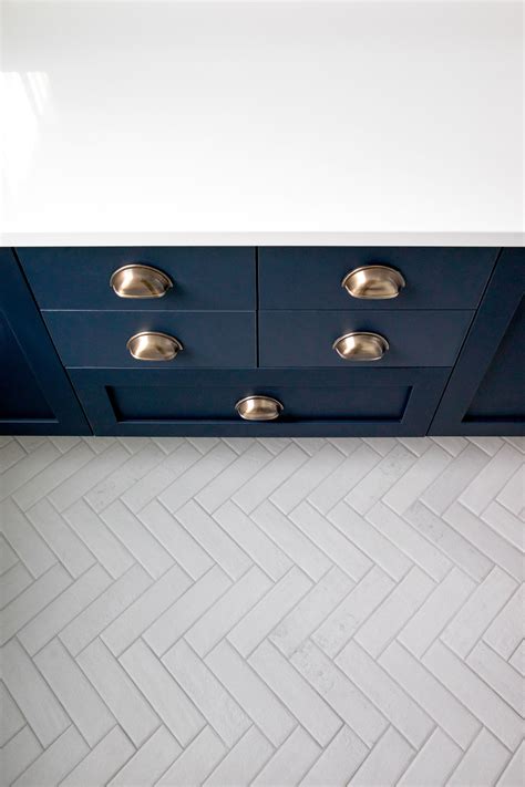 White Herringbone Bathroom Tile In 2020 Herringbone Tile Floors