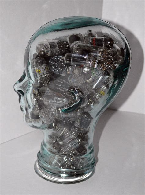 upcycled thick clear glass mannequin head displays vintage glass test tubes steampunk