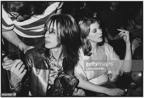 Rock Musician Todd Rundgren And Model Bebe Buell In The Audience At A