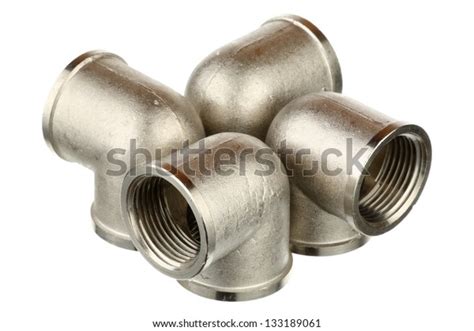 Four Metallic Fittings Isolated Over White Stock Photo 133189061
