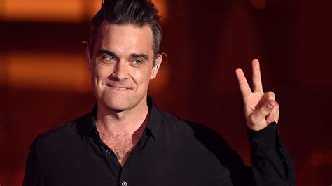 Robbie Williams Turned Down The Opportunity To Join Queen And... Wait ...