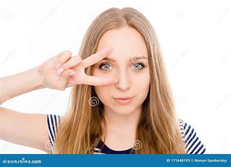 Cute Girl Gesturing With Two Fingers Near Her Eye Stock Image Image