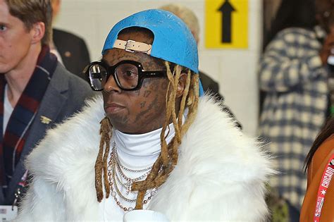 Lil Wayne Charged With Possession Of A Firearm And Ammunition