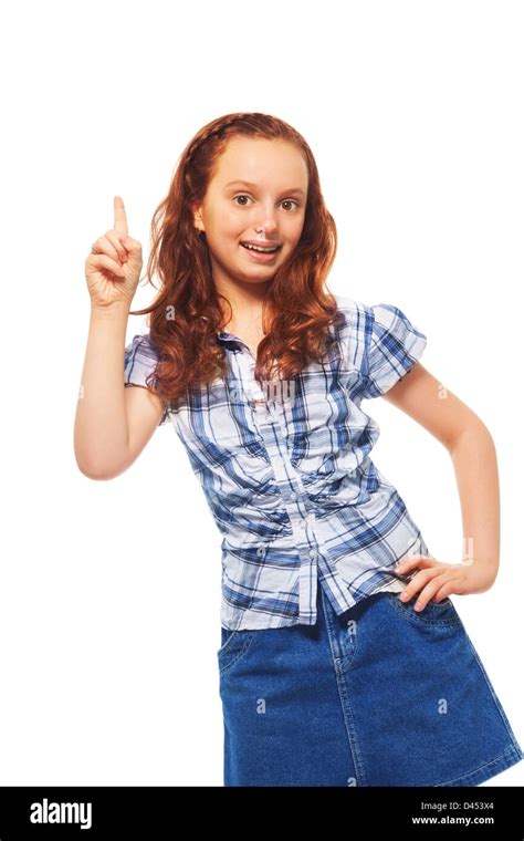 Portrait Of Happy Pointing Finger Gesturing Having And Idea 12 Years Old Girl With Curly Hair