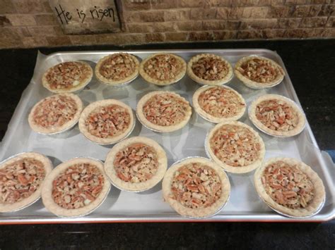 If crust puffs up, press down with the back of a measuring cup. Granny's Pecan Pie Tarts - Family Savvy