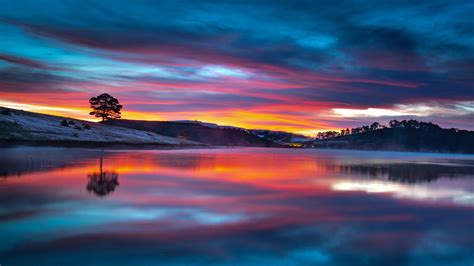 Download 3840x2160 Lake Reflections Sunset Clouds Nature 4k
