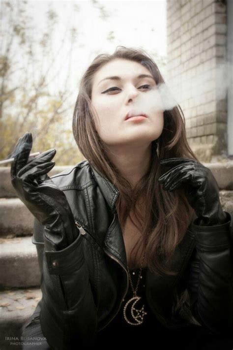 Women Wearing Leather Gloves And Smoking Cigars In London