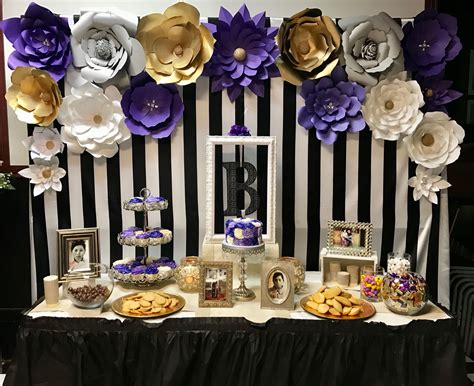 Maybe you would like to learn more about one of these? Dessert table with paper flowers backdrop for purple ...