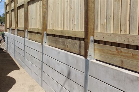 Pioneer Smooth Grey Concrete Sleeper Retaining Wall With A Timber Fence