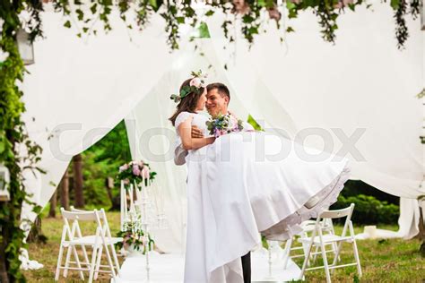 Happy Wedding Day Under The Flower Arch Stock Image Colourbox