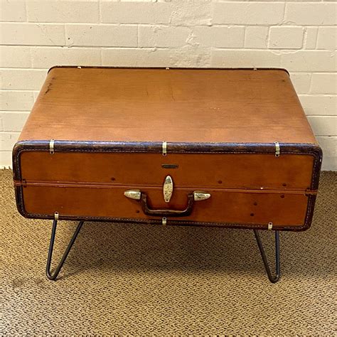 Depending on the suitcase size, you may need to use a circular saw to make one or both cuts if it won't fit through the table saw. Vintage Suitcase Coffee Table - Leather & Sporting Goods ...