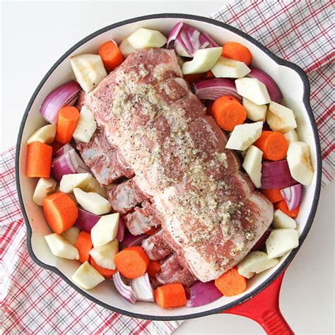 Put meat in a roasting pan surrounded by onions, carrots and celery. One Pot Oven Roasted Bone In Pork Rib Roast with ...