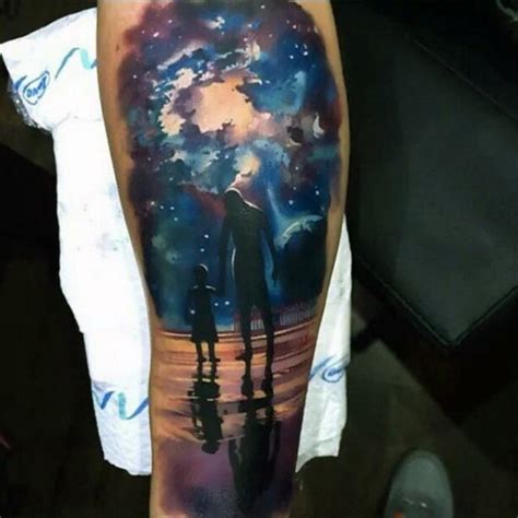 Pretty night sky with the moon and stars, as on half of a wolf face, done on woman's arm. Sweet themed colored father and son under night sky tattoo ...