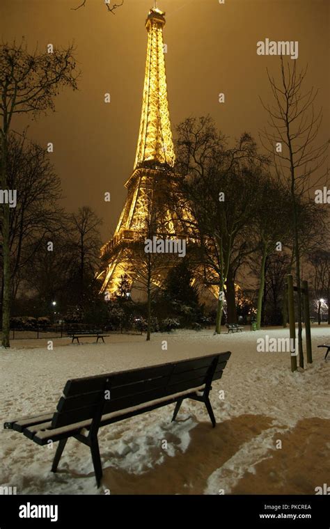 Romantic Snowy Park Near The Eiffel Tower Paris France Stock Photo