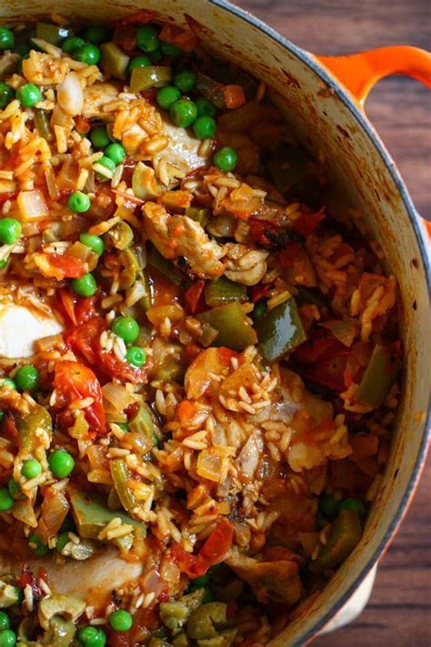 Bright and spicy and comforting! Arroz con Pollo | Food recipes, Mexican food recipes ...