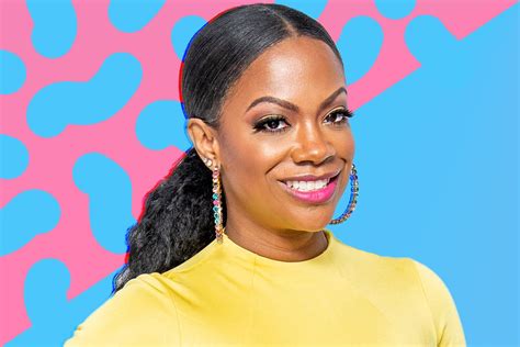 Kandi Burruss Stuns In Pink Bathing Suit And Pigtails While On Vacation